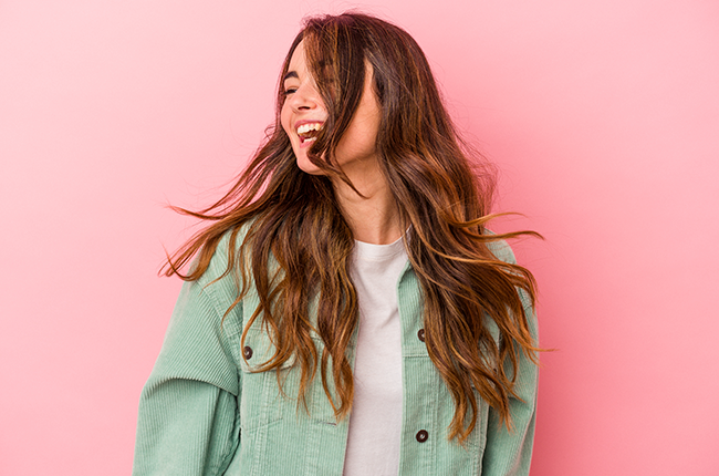 young-caucasian-woman-isolated-pink-background-dancing-having-fun